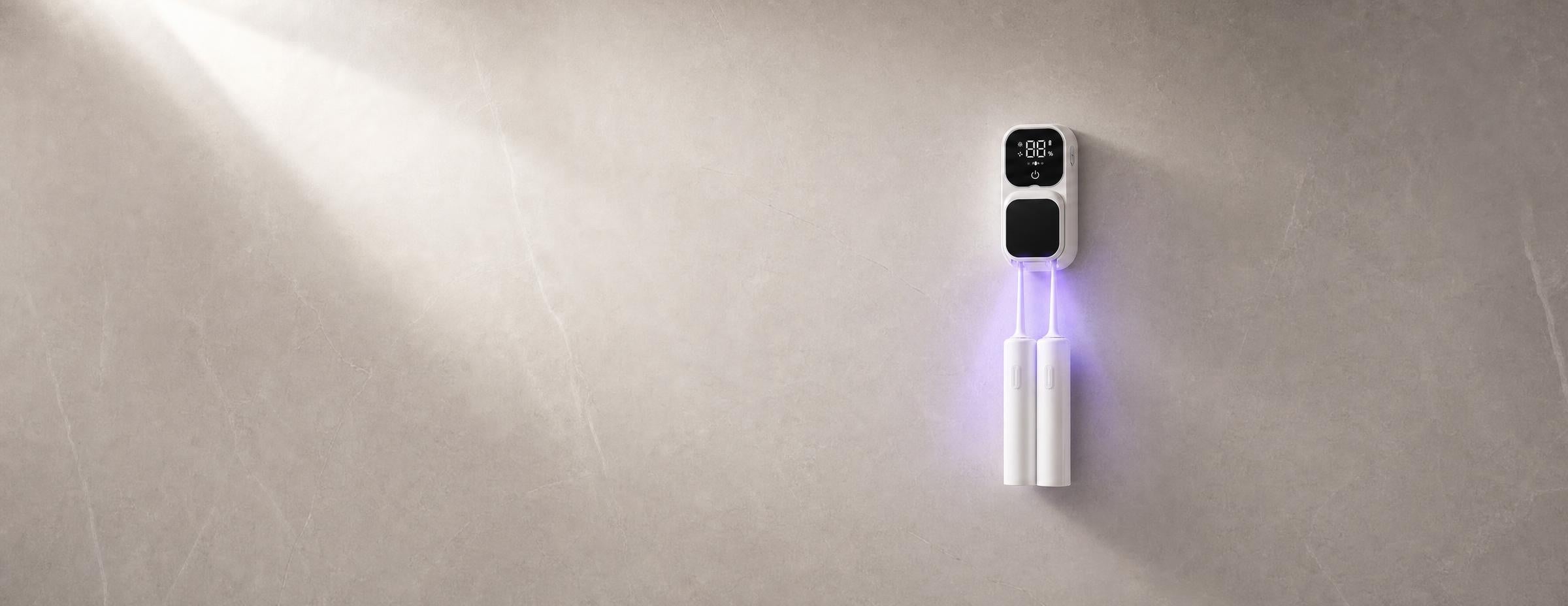 Lumivé UV sterilizer mounted on a stone bathroom wall